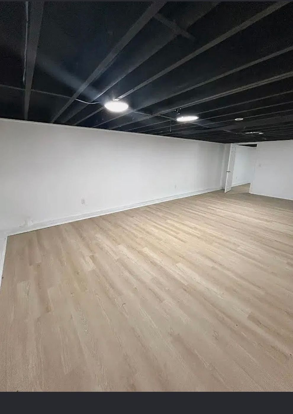 Large finished basement with new flooring